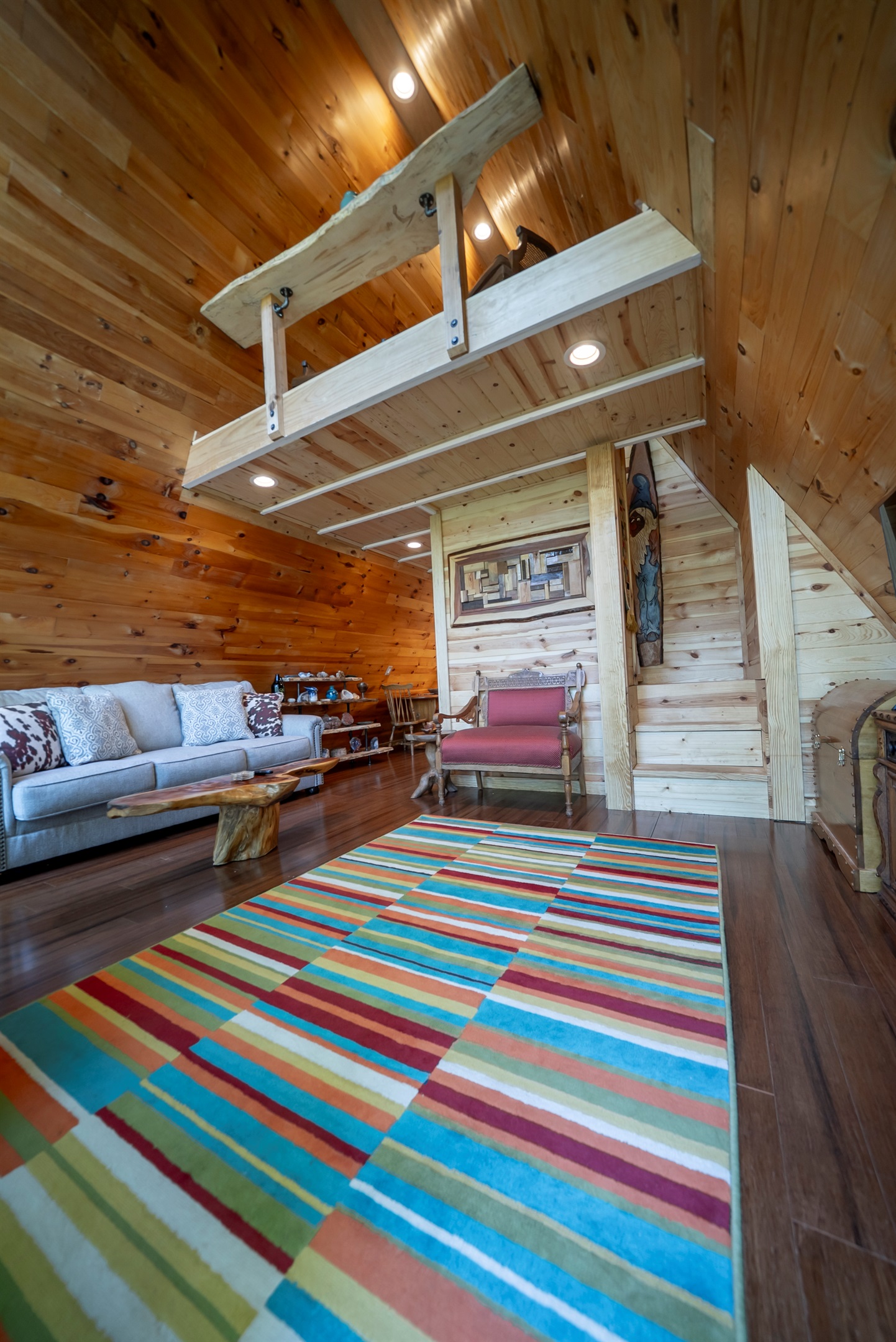 Relax, unwind, and take in the view—this inviting space blends comfort, natural light, and Laurel Cove’s unique character.