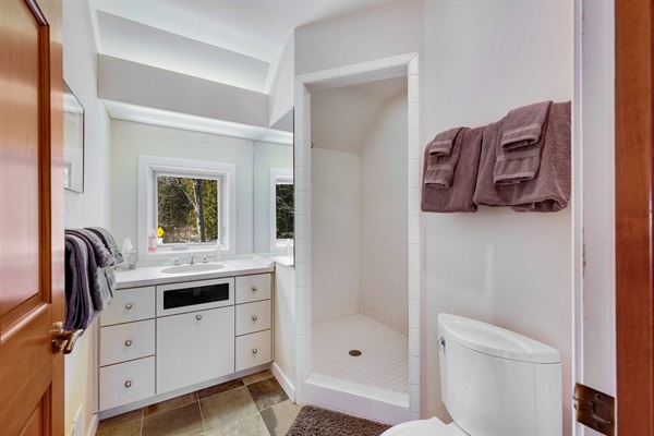 Second upstairs bathroom. Roomy walk-in shower.