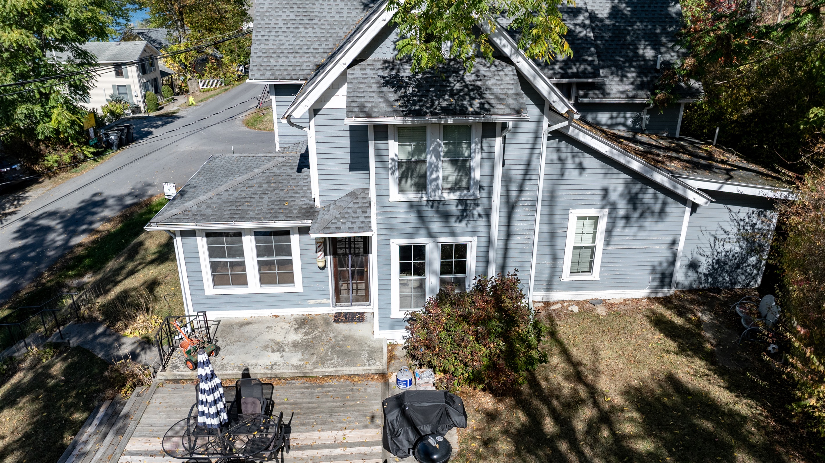 Charming lake-view home with modern farmhouse design and inviting curb appeal — your cozy getaway awaits