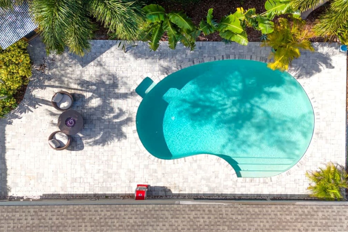 Sparkling blue pool inviting year-round dips.