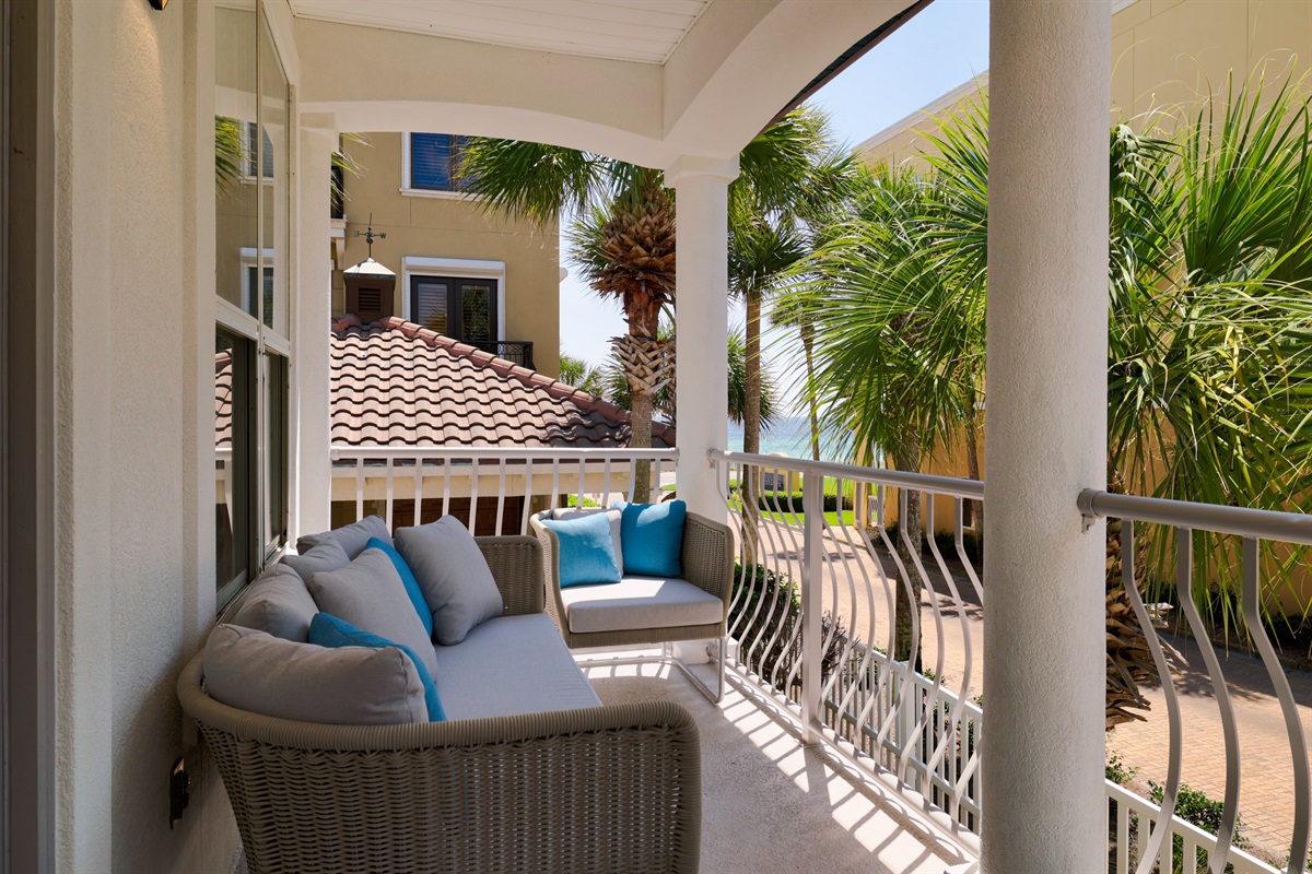 Comfortable Seating on the 2nd Floor Patio with Partial Gulf Views, Accessible from the Living Room - Perfect for morning coffee or a cold afternoon beverage!