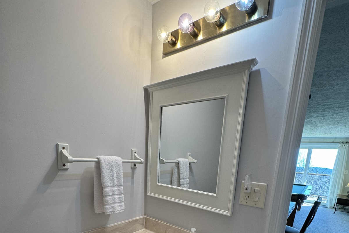 This Lower Level full bathroom has a shower with a curved shower rod & recently got a mini update! Professional pics coming soon of the changes!