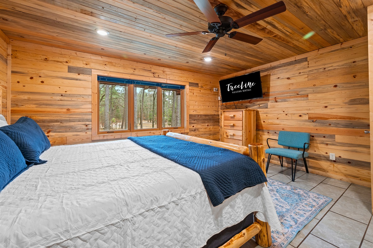 Seen from another angle, the bedroom feels spacious and calming, with plenty of room to unwind at your own pace.