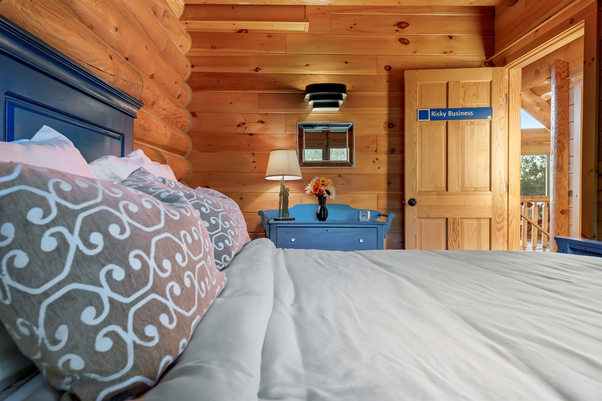 Relax in these cozy main level bedrooms with queen beds and dressers.