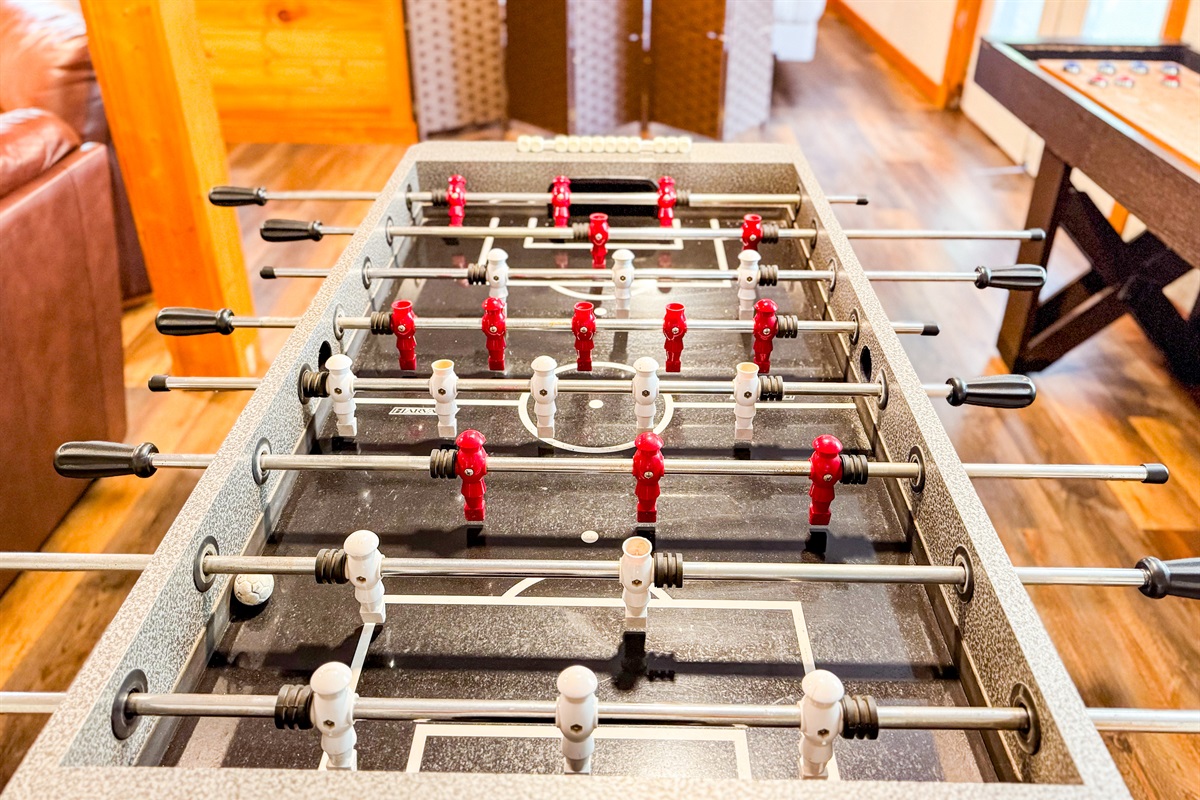 How about a friendly or super competitive(depends on your family) game of foosball?