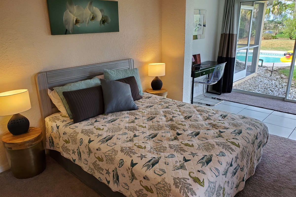 Queen bedroom with pool view