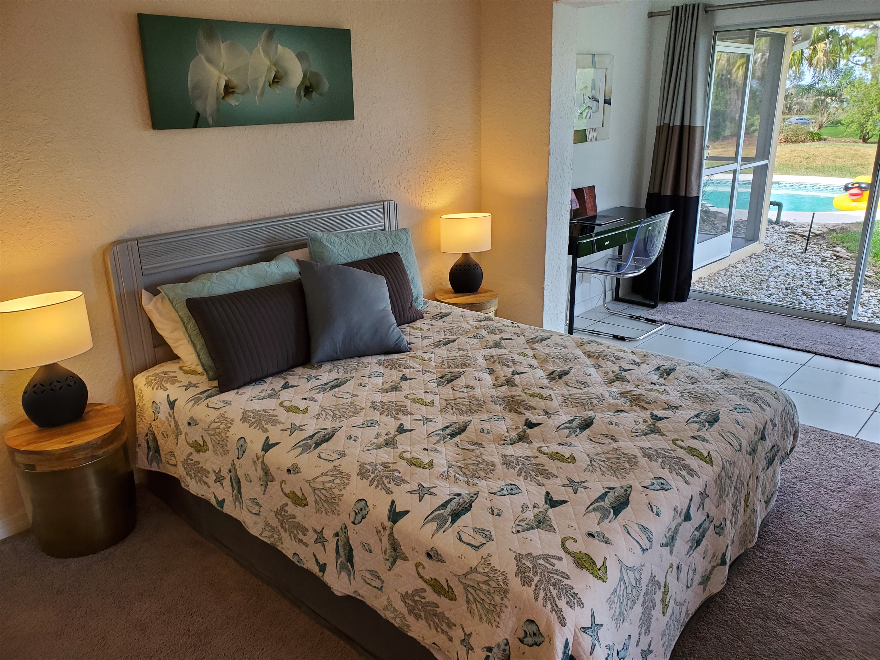 Queen bedroom with pool view