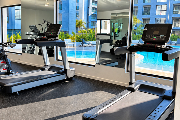Stay active during your stay with access to the community fitness center. 💪🏽✨