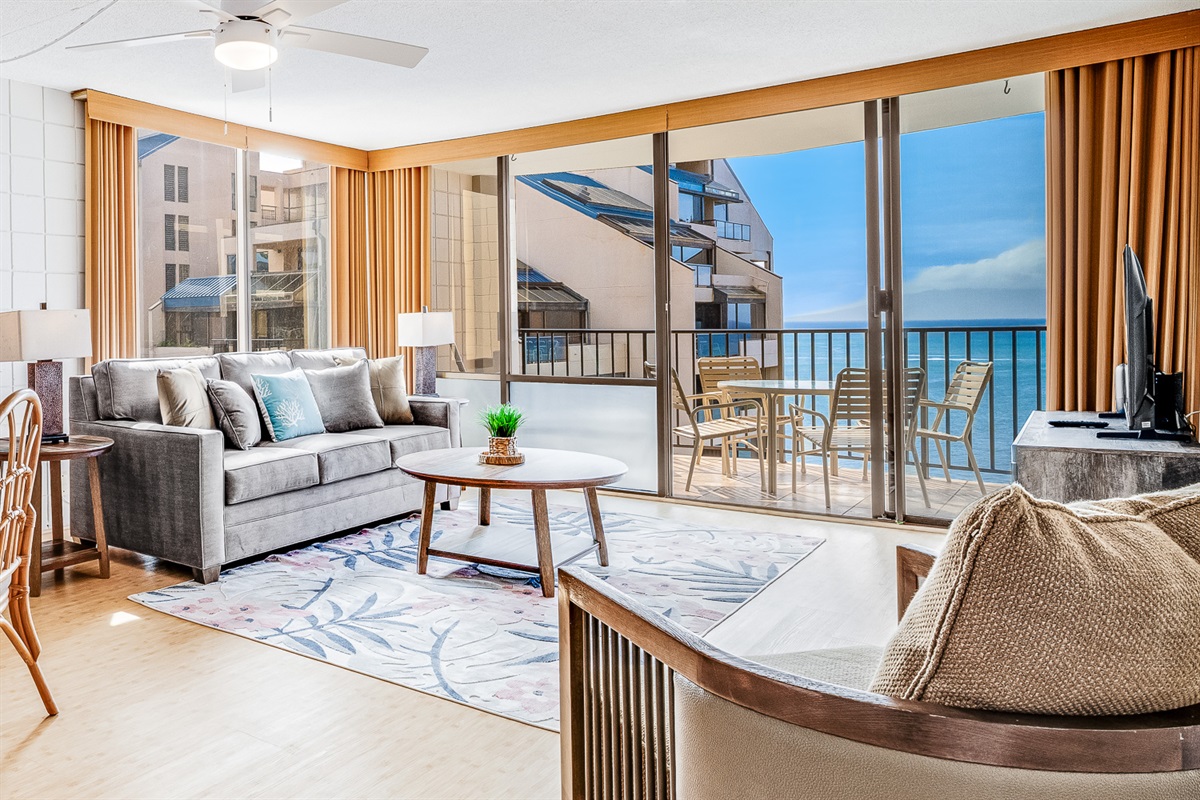 Spacious ocean view living room with sleeper sofa