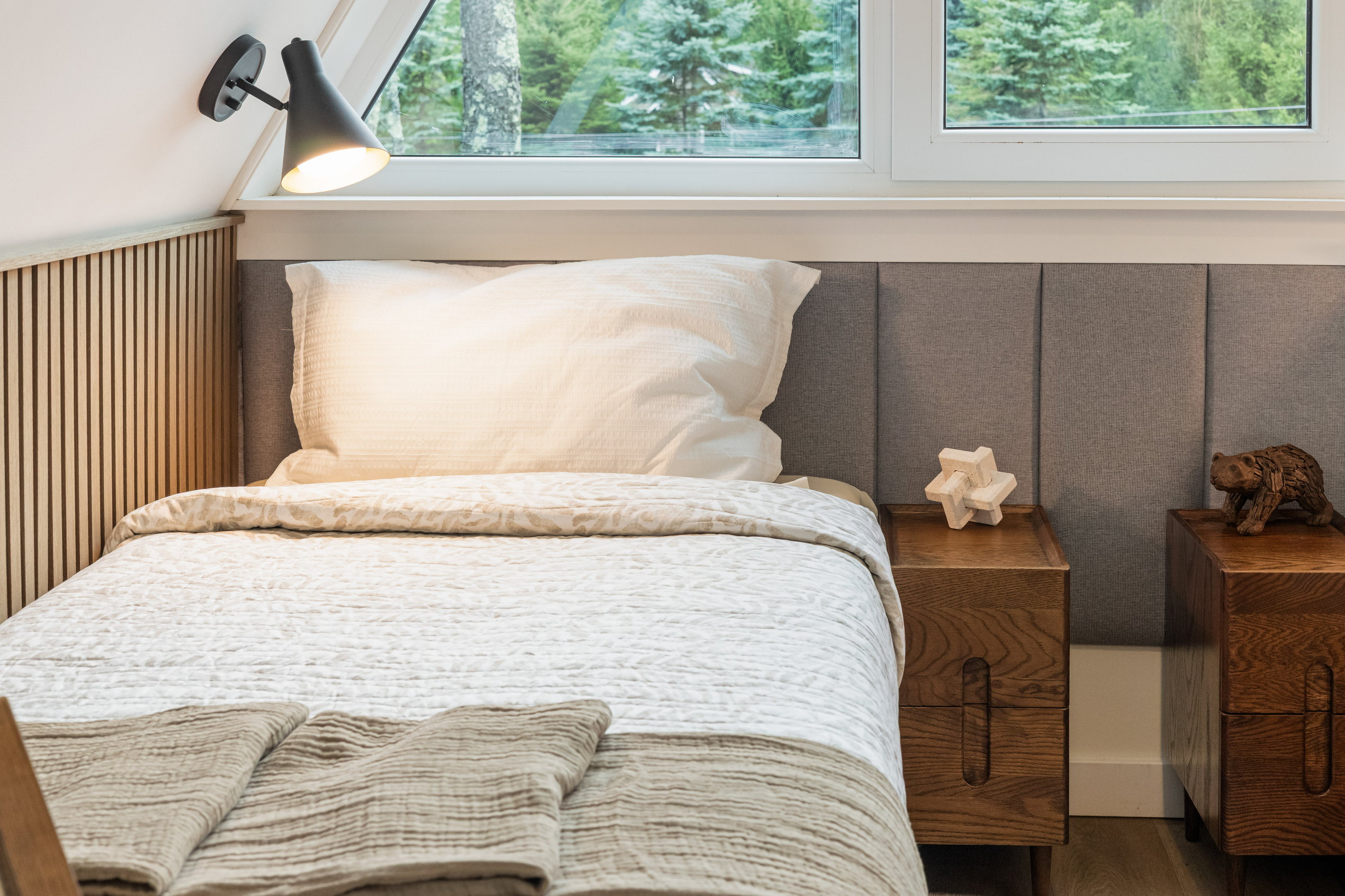 Twin bed, reading light, real pillow