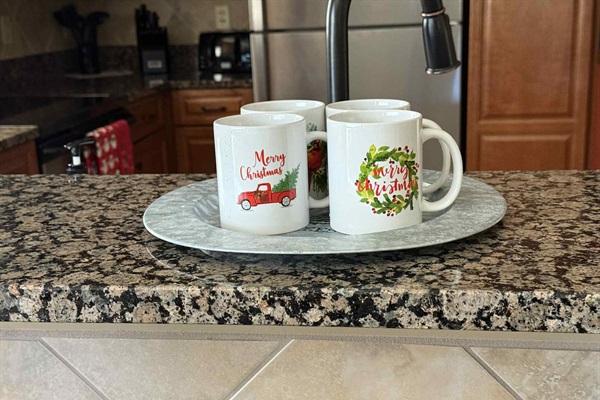 Enjoy our morning coffee in a festive Christmas mug.