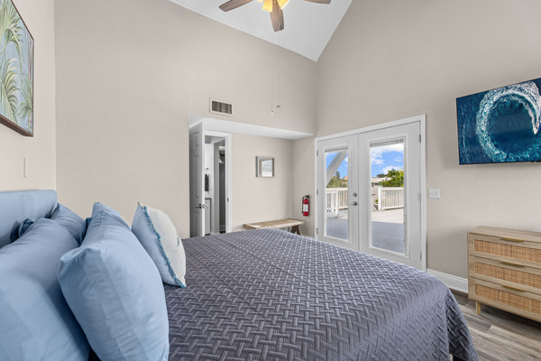 The primary bedroom has access to the sundeck.