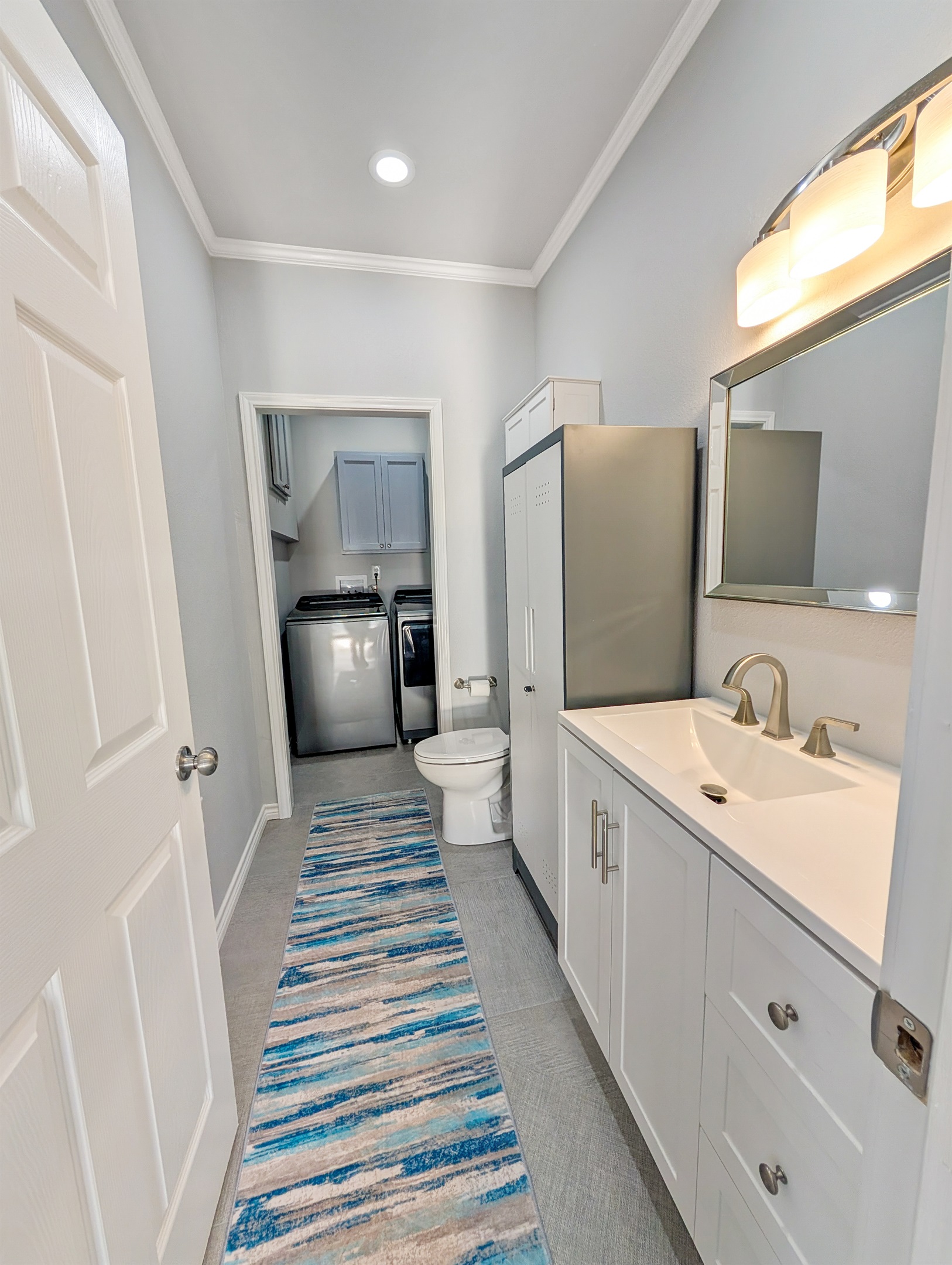 Half bath attached to the laundry