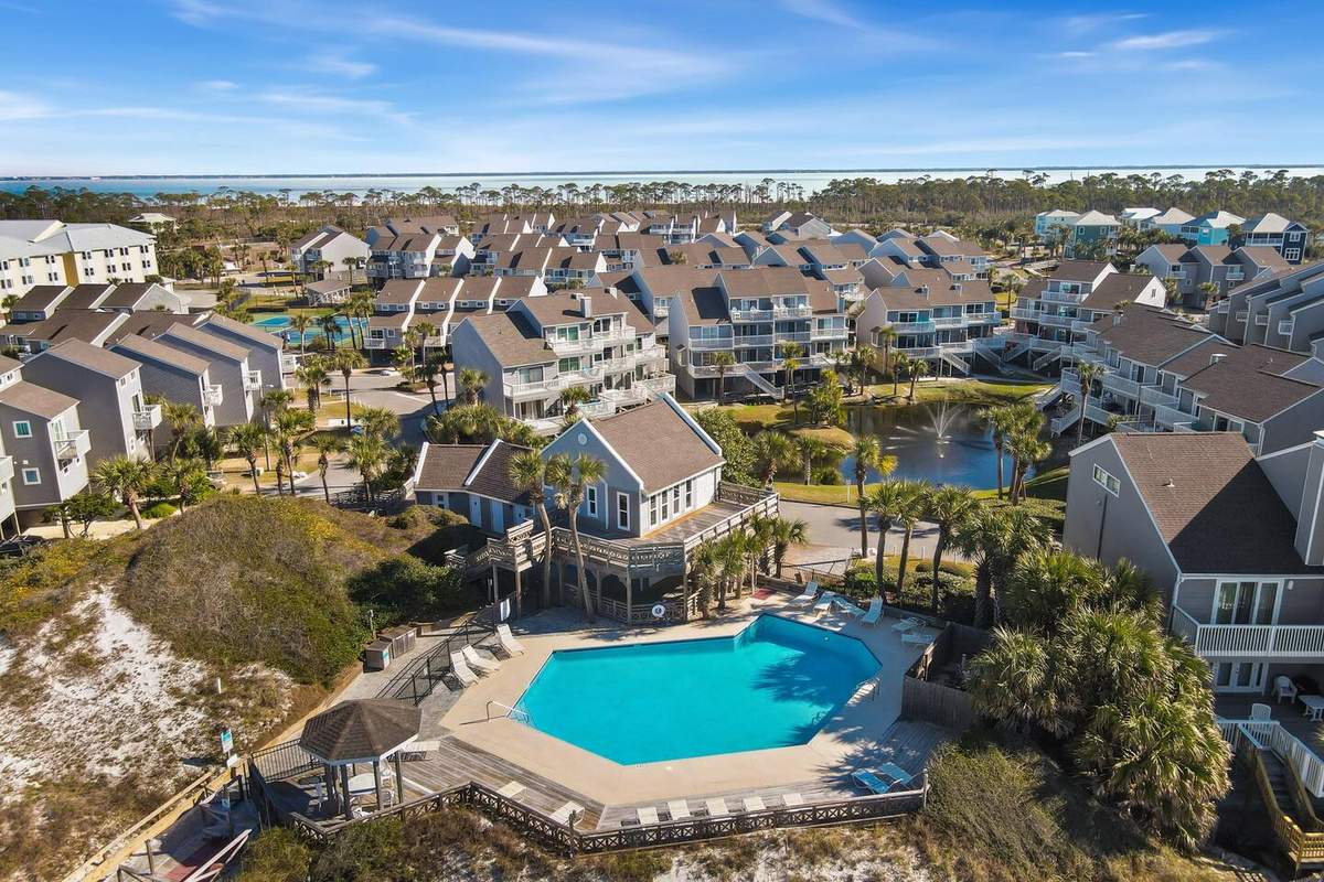 Float in the pool surrounded by dunes with the Gulf just beyond &mdash; the kind of afternoon spot that makes it hard to go back inside.