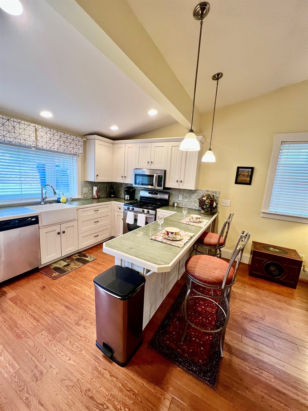 Cooking is a breeze in this fully equipped kitchen, featuring modern appliances and ample counter space.