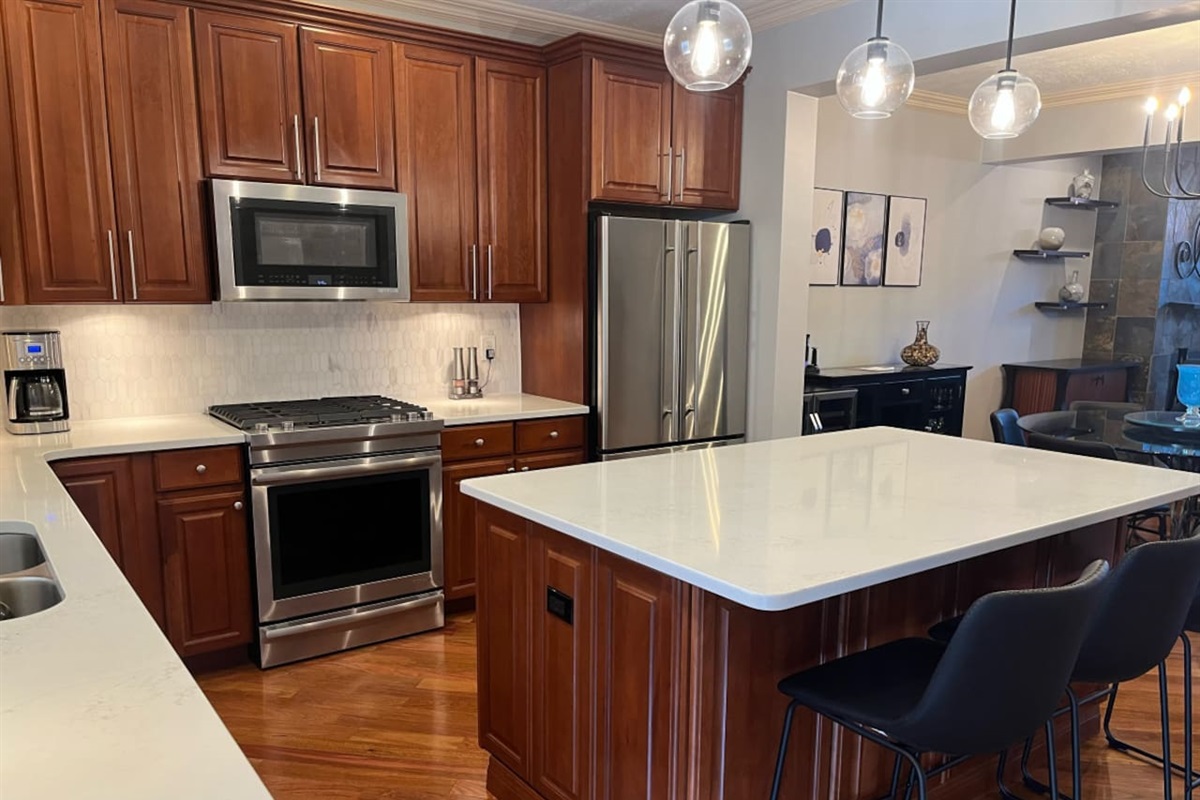 Elegant kitchen featuring sleek cabinetry, modern appliances, and stylish finishes, creating a perfect space for cooking and entertaining.