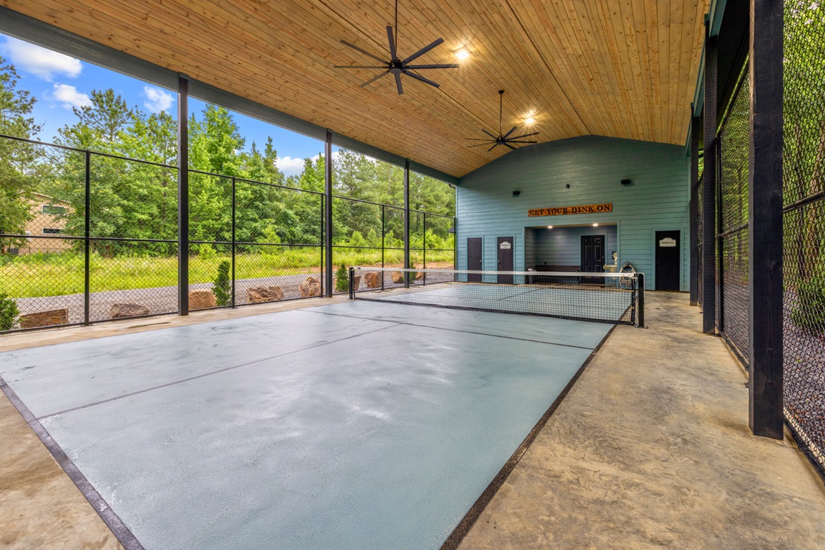 Feel the excitement of a great game on this inviting and clean pickleball court.