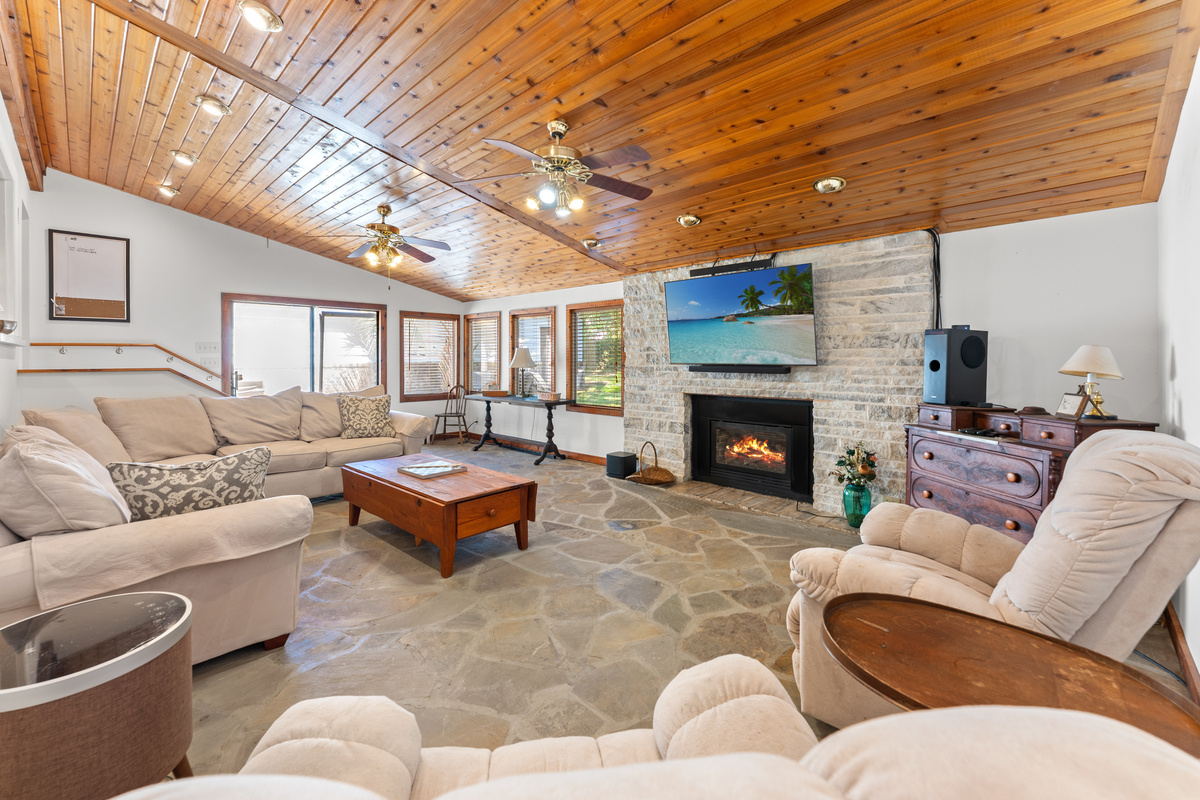 Sunkin Family Room on lower level with large TV and outside access