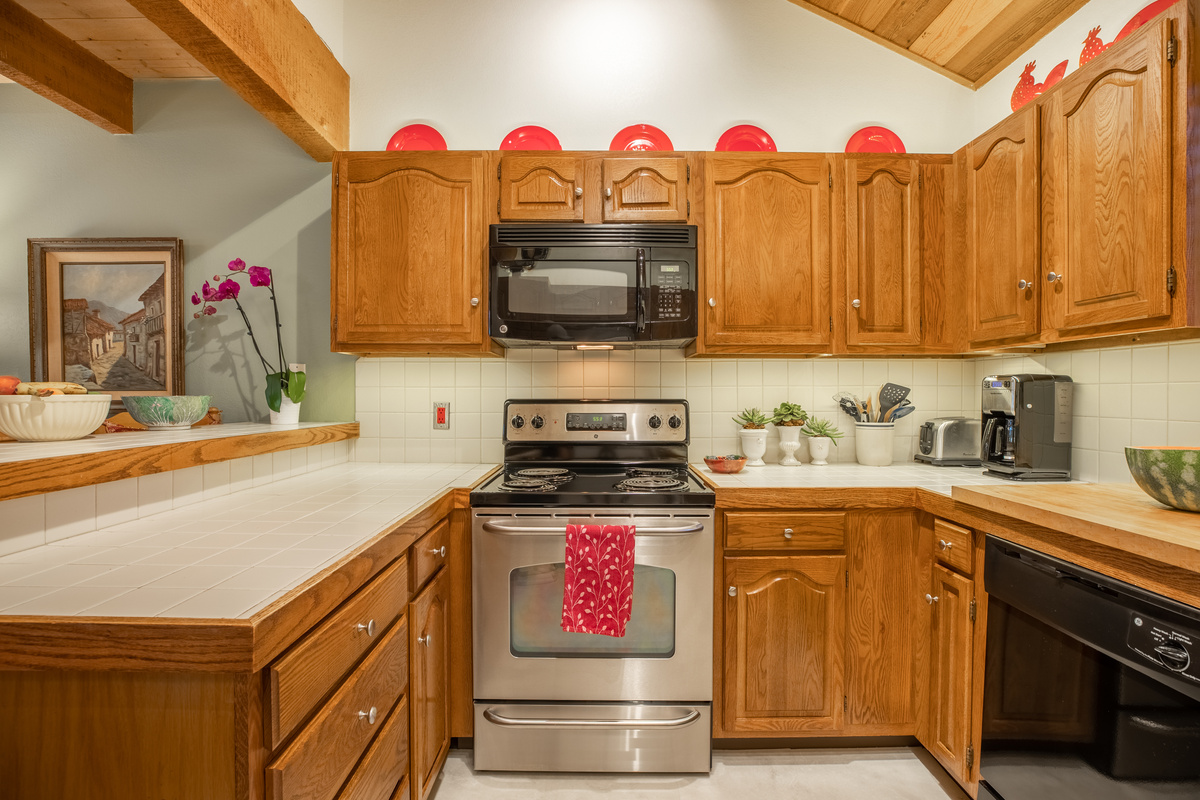 Well-equipped kitchen with classic cabinetry