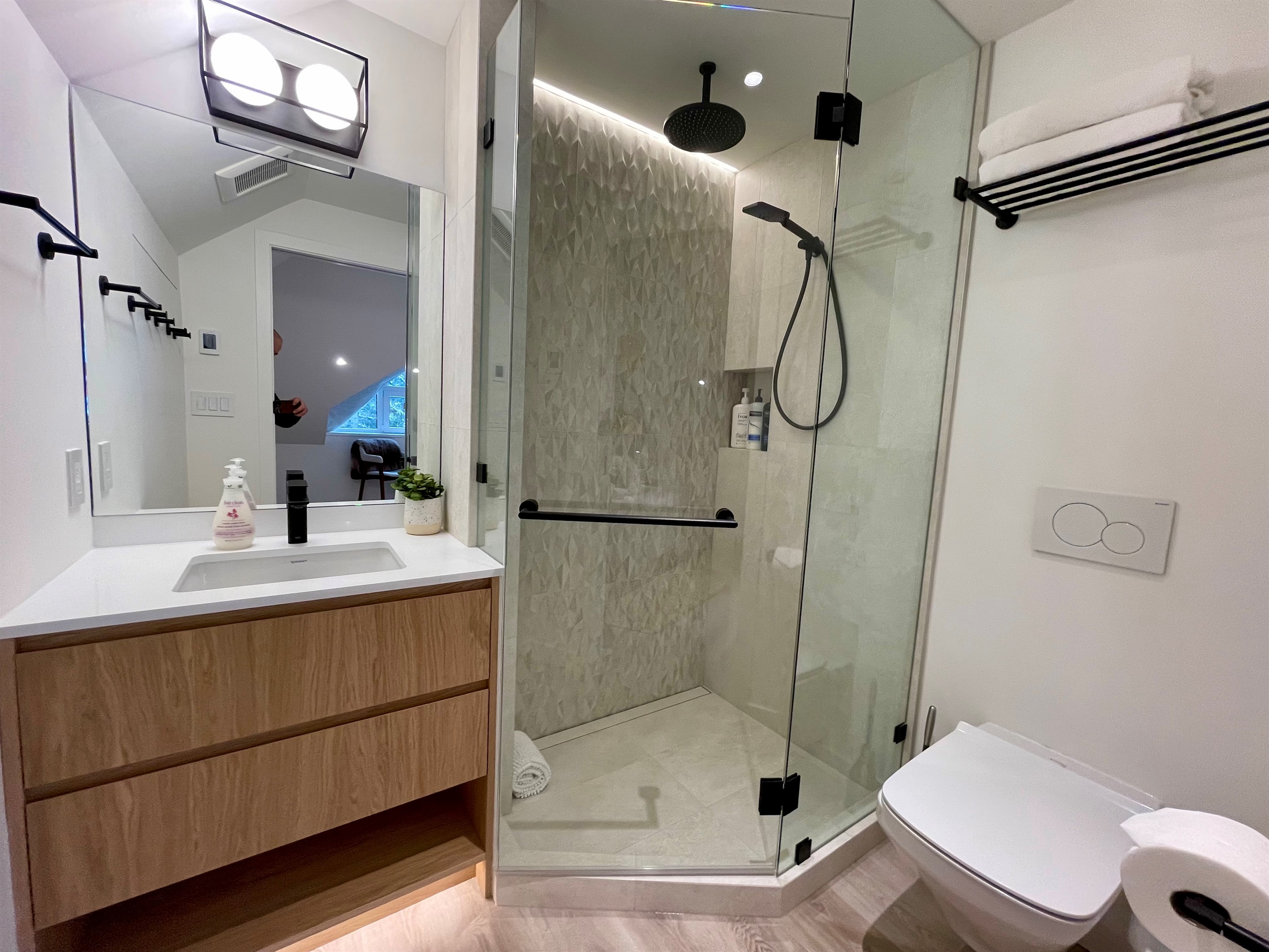 Ensuite Bathroom - Walk-In Shower, heated floor, wall hung toilet, Dimmable LED accent lighting, motion sensing under cabinet lighting 