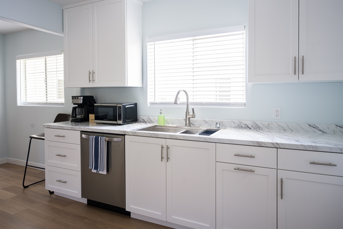 Stainless appliances and coffee for breakfast prep
