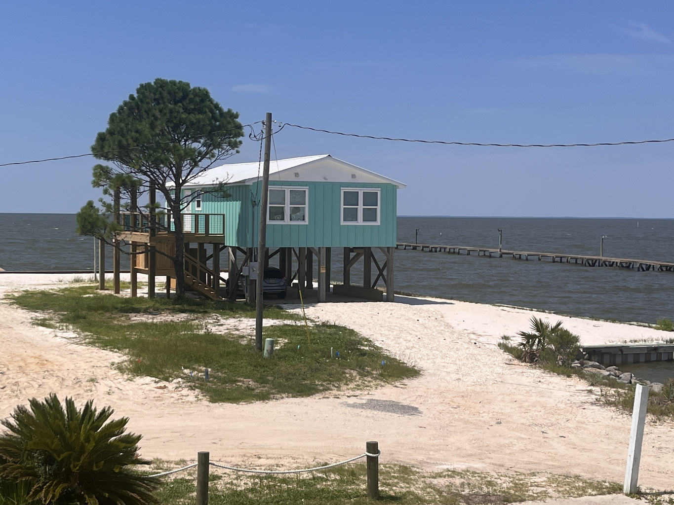 Welcome to Serenity Now! Experience the ultimate coastal retreat at this beautifully maintained home