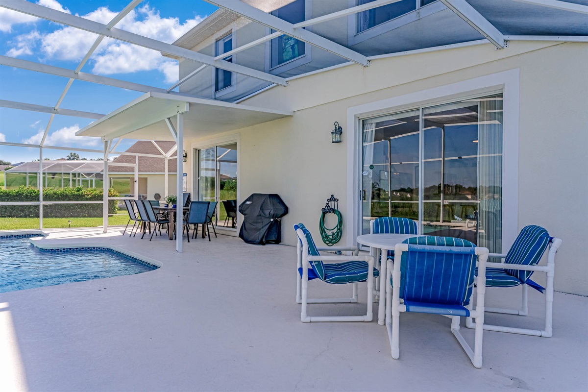 Plenty of seating on the pool deck for eating out doors.