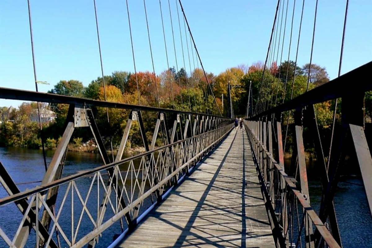 Explore downtown with a stroll across Waterville's Two Cent Bridge
