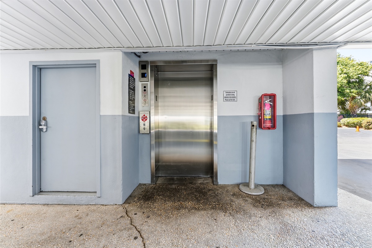 Elevator in the parking area under the building.