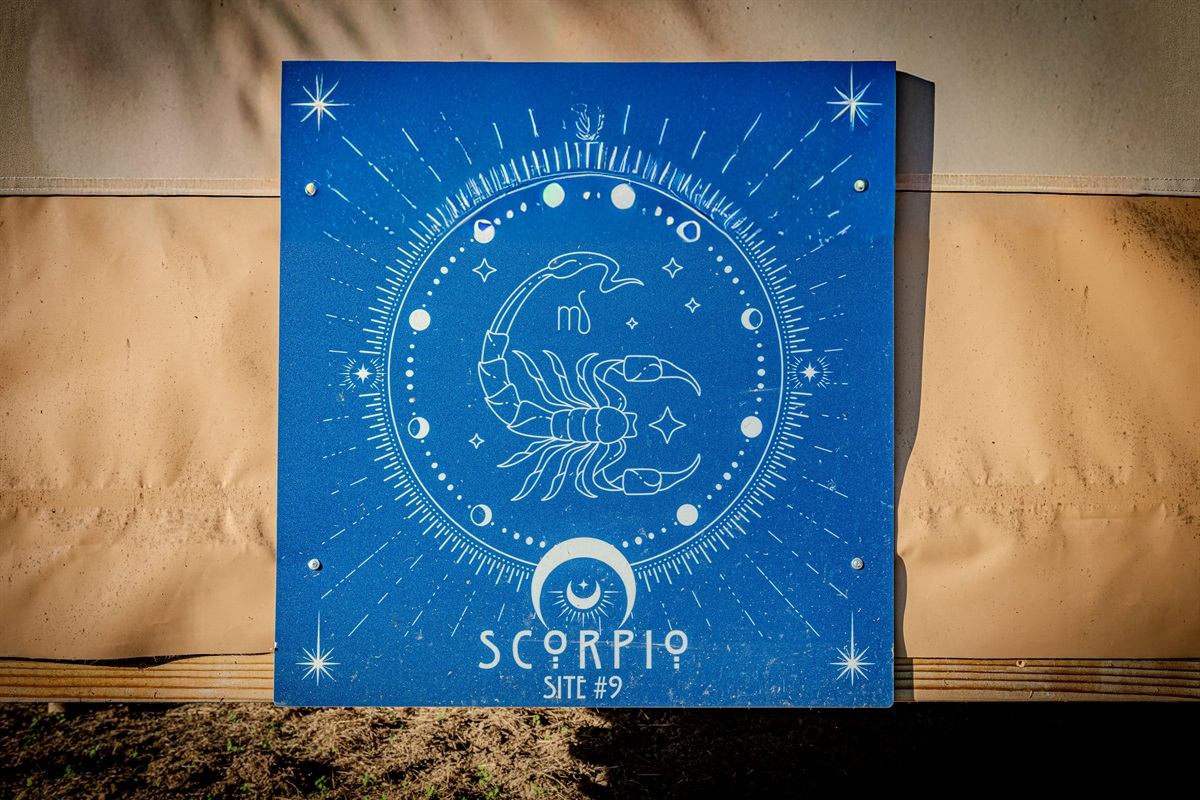 When you see this sign on the back of the tent, you'll know you've arrived.