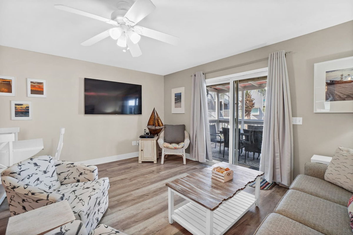 Take in the big Smart TV or slide open the glass door and let the deck pull you outside instead.