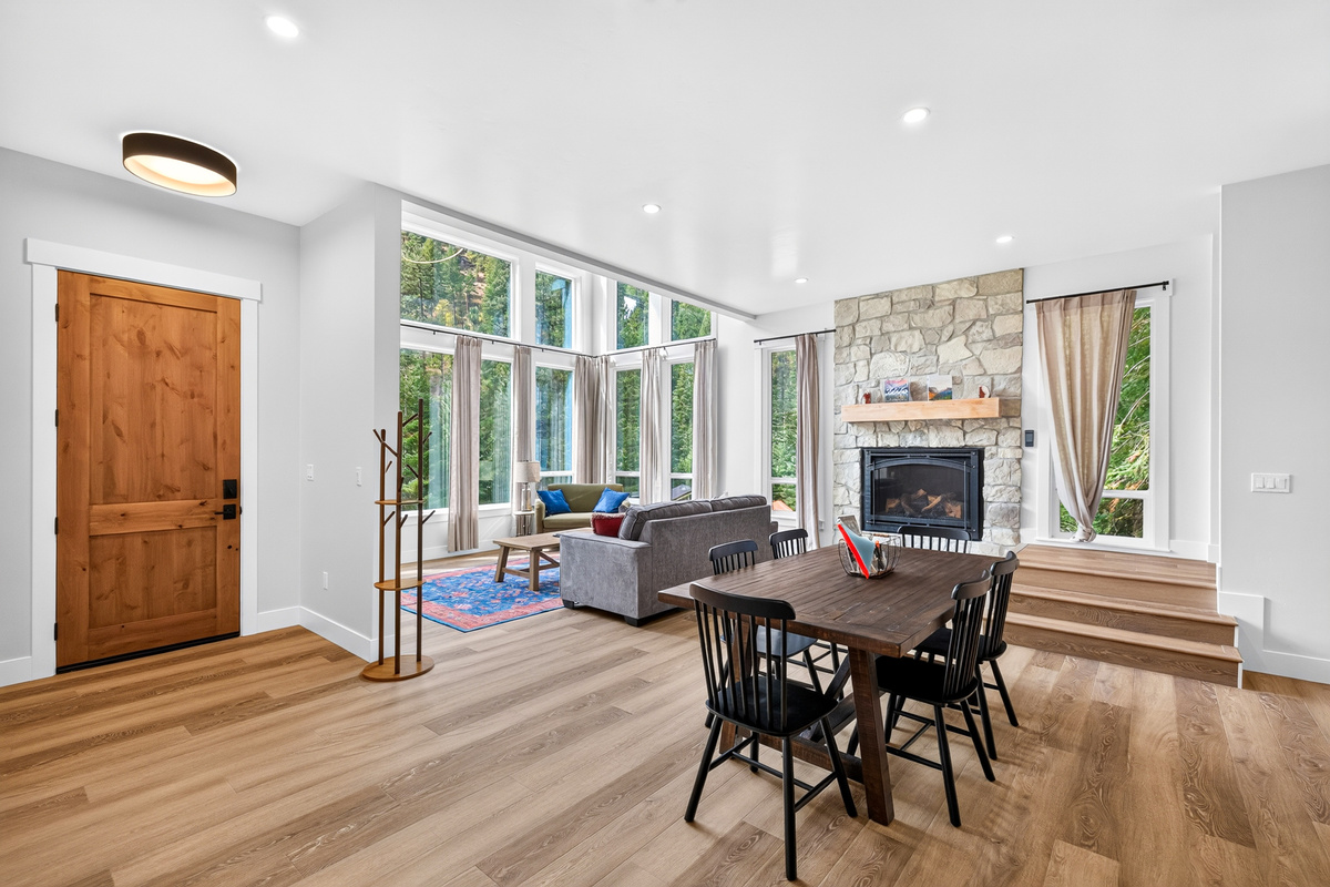 Stunning great room with fireplace, eating and lounging space for your entire party.  There's a large sleeper in the sofa for 2 additional guests.