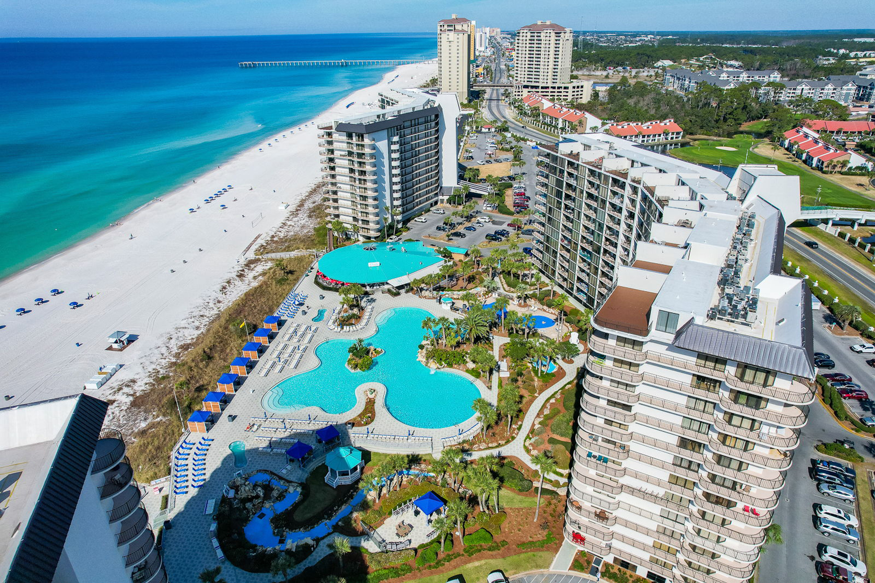 Edgewater's beachfront lagoon-style pool designed with true relaxation in mind with serene built-in waterfalls