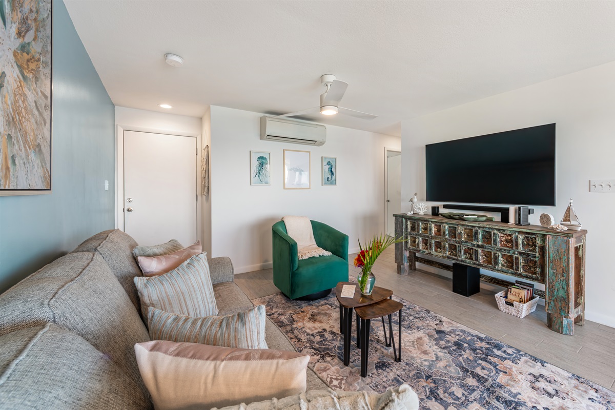 Living room with Smart TV and comfortable sleeper sofa