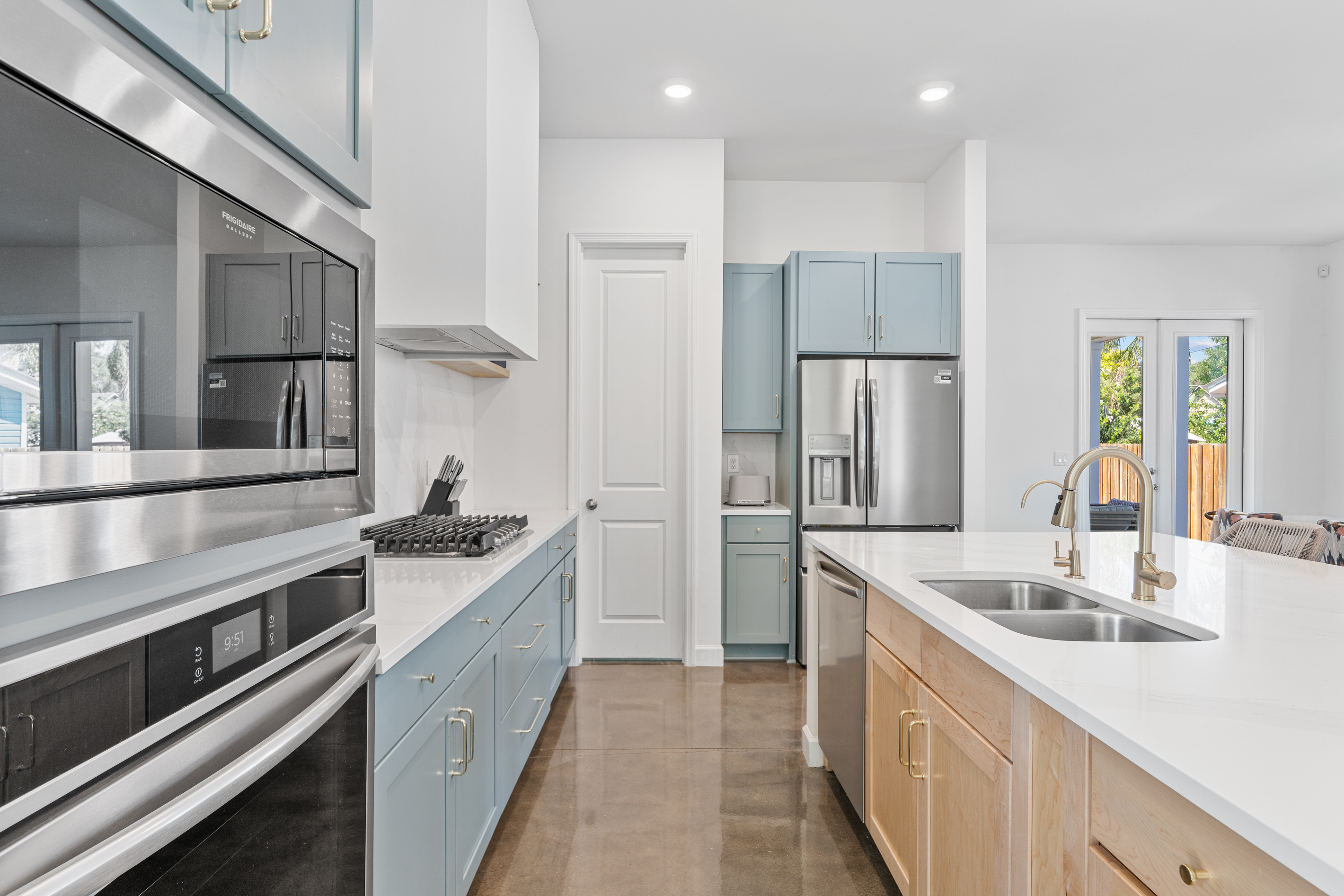 Everything a family cook could want: gas burners, double ovens, a walk-in pantry and counter space to spare. Line the kids up for assembly-line sandwiches, then slip out back to eat while the light still lasts.