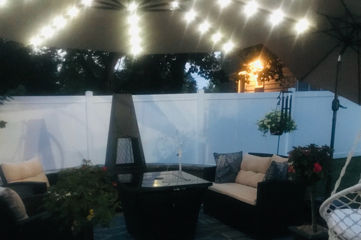 Patio seating and firepit offer a comfortable place to unwind after dark.