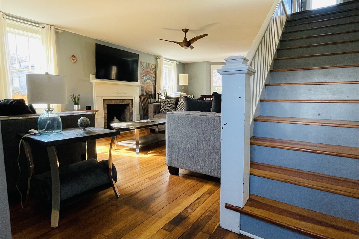 Perspective of steps going to the upstairs bedrooms from the living room