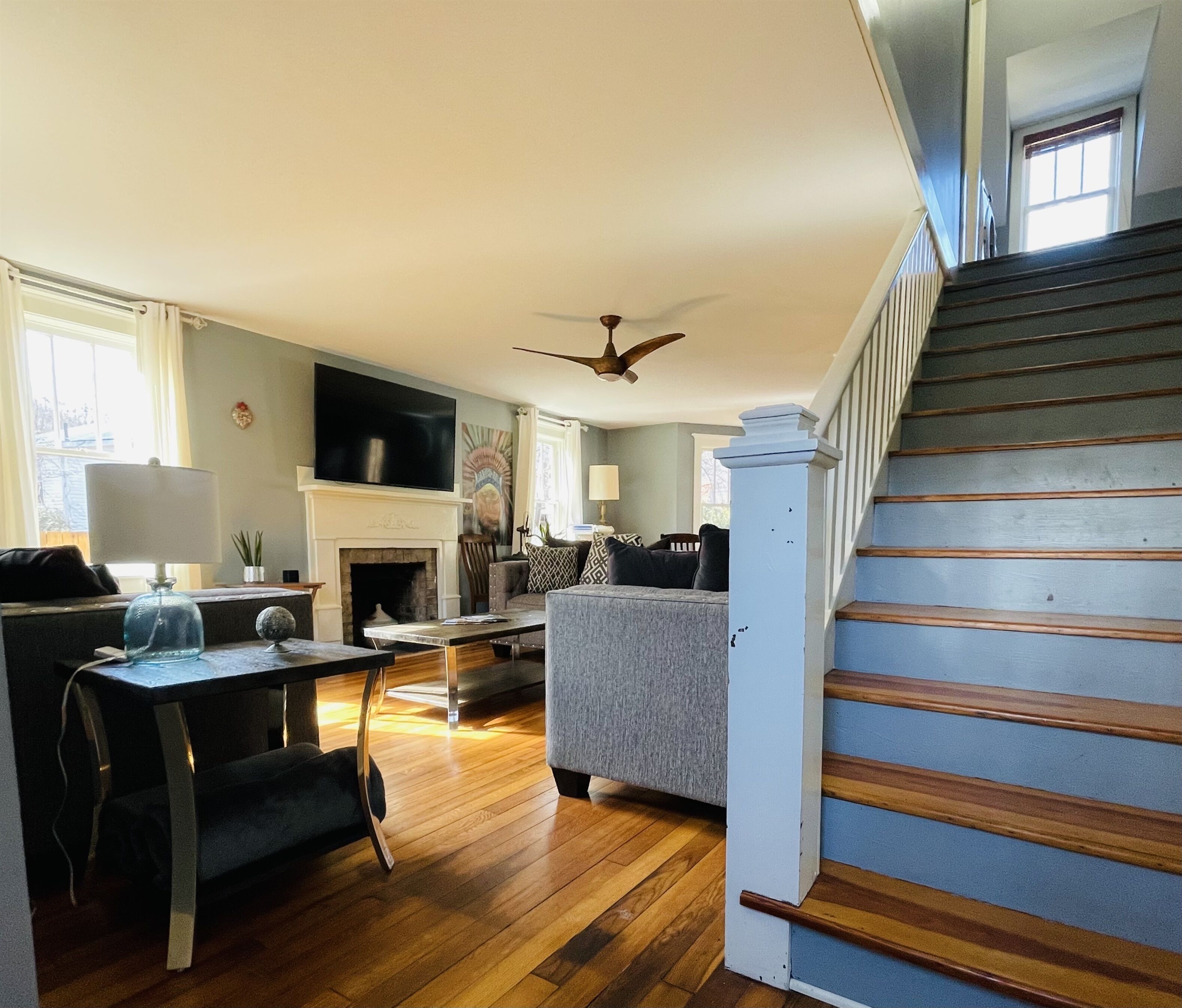 Perspective of steps going to the upstairs bedrooms from the living room