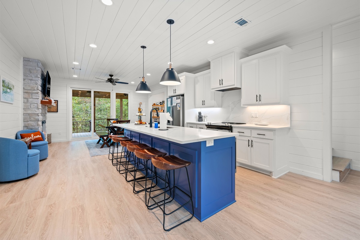 Open-concept kitchen and living area with modern finishes.