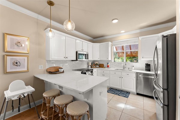 Bright, Fully Equipped Kitchen with Island Seating