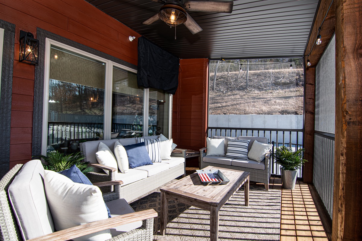 WOW! Check out the two back decks at Lake Haven! This one is screened in!