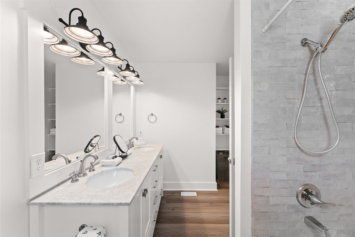 Side B Master: Refresh in a sleek, modern ensuite with premium finishes.