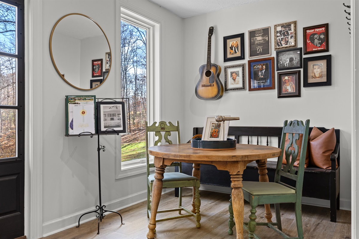 Inspiration room lined with artist images lining the walls.