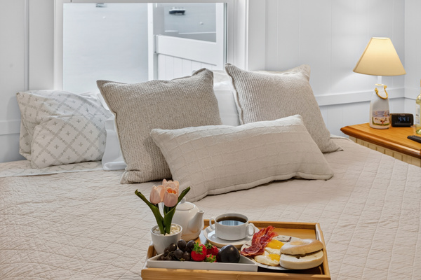 Enjoy a leisurely morning with breakfast in bed and scenic waterfront views.