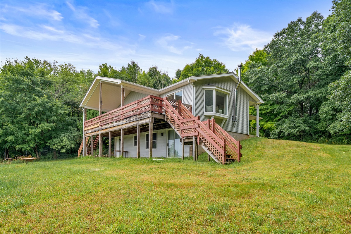 Spacious walkout lower level and elevated wraparound deck offer endless outdoor possibilities