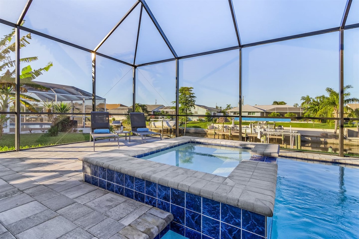 Relax and soak up the sun in the spacious lounging area with a refreshing spa!