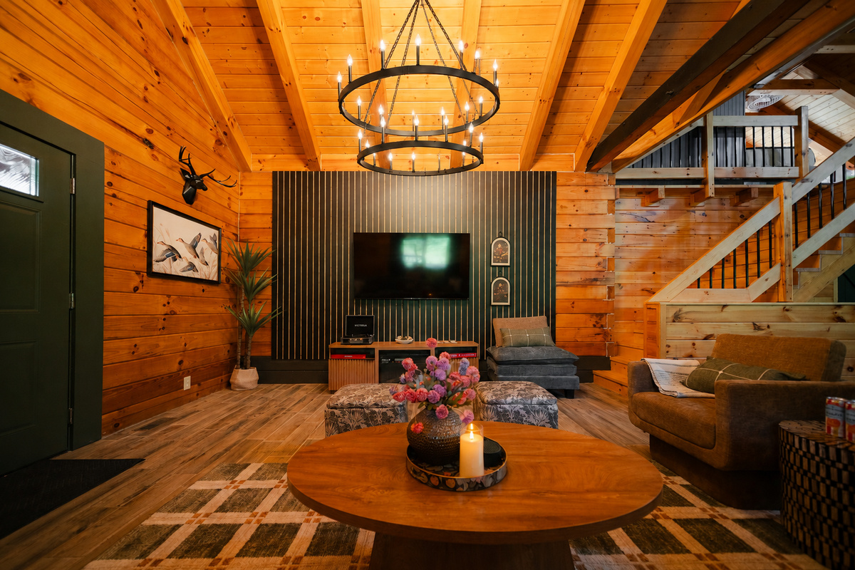 Inviting living room with comfortable seating and a TV, perfect for relaxing and spending time together.