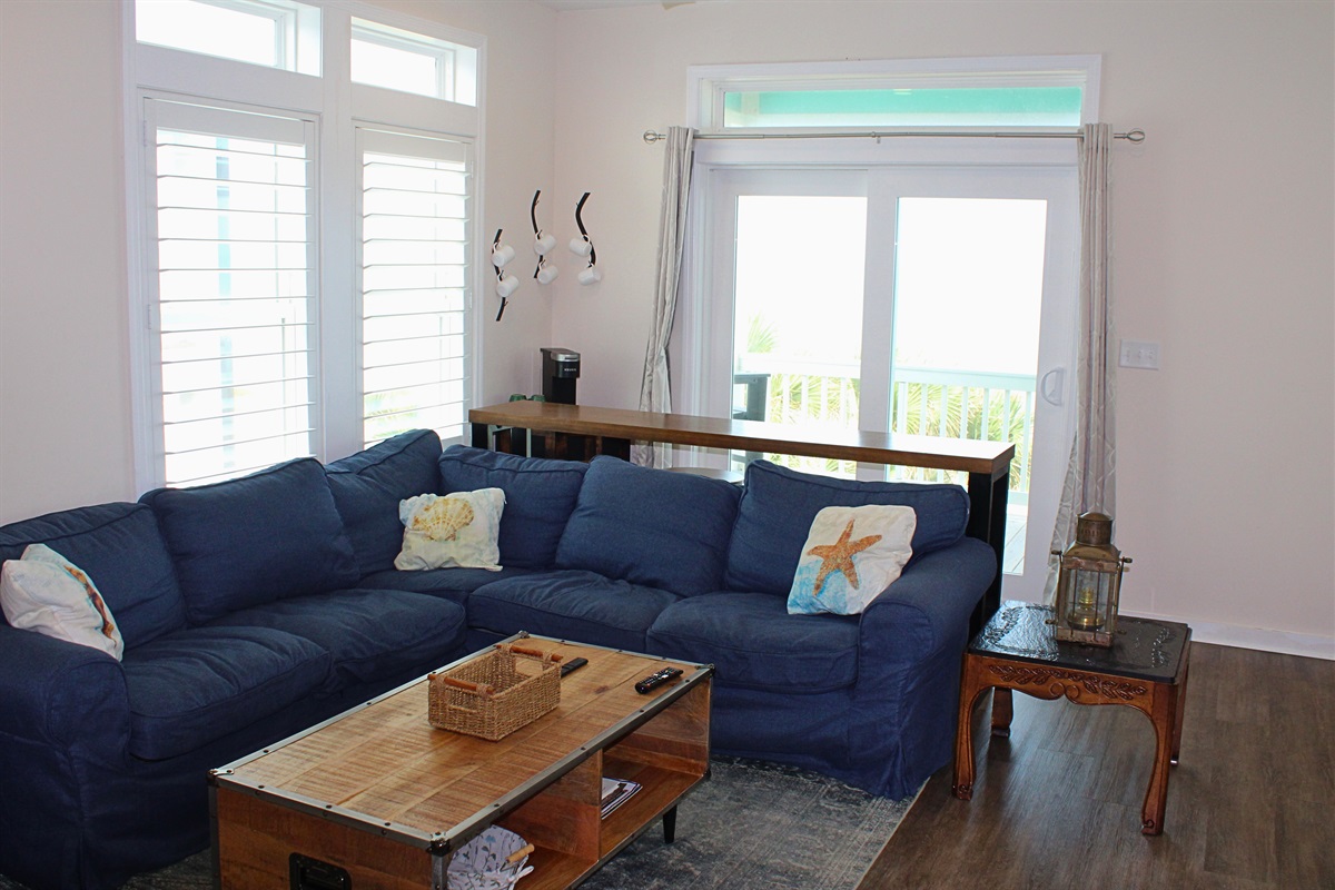 Living Room: A cushy couch to maximize relaxation and bar seating means there's room for everyone!