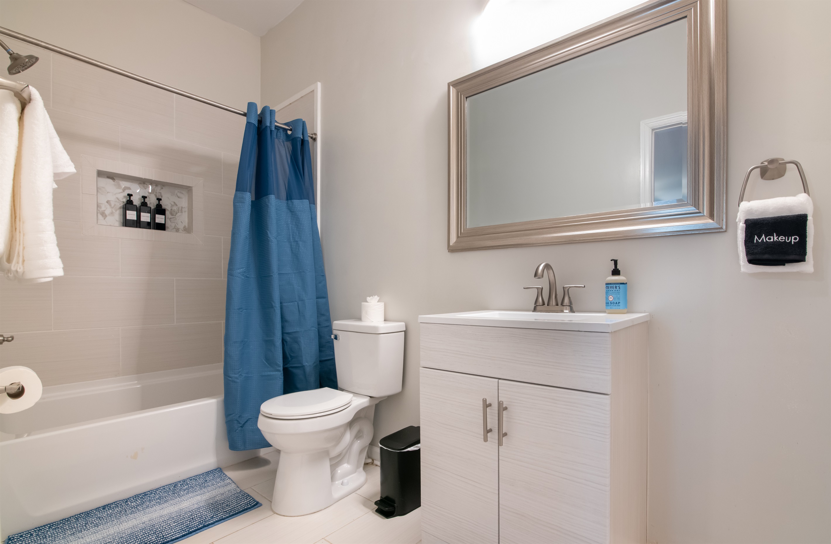 A beautifully lit bedroom where comfort meets style.