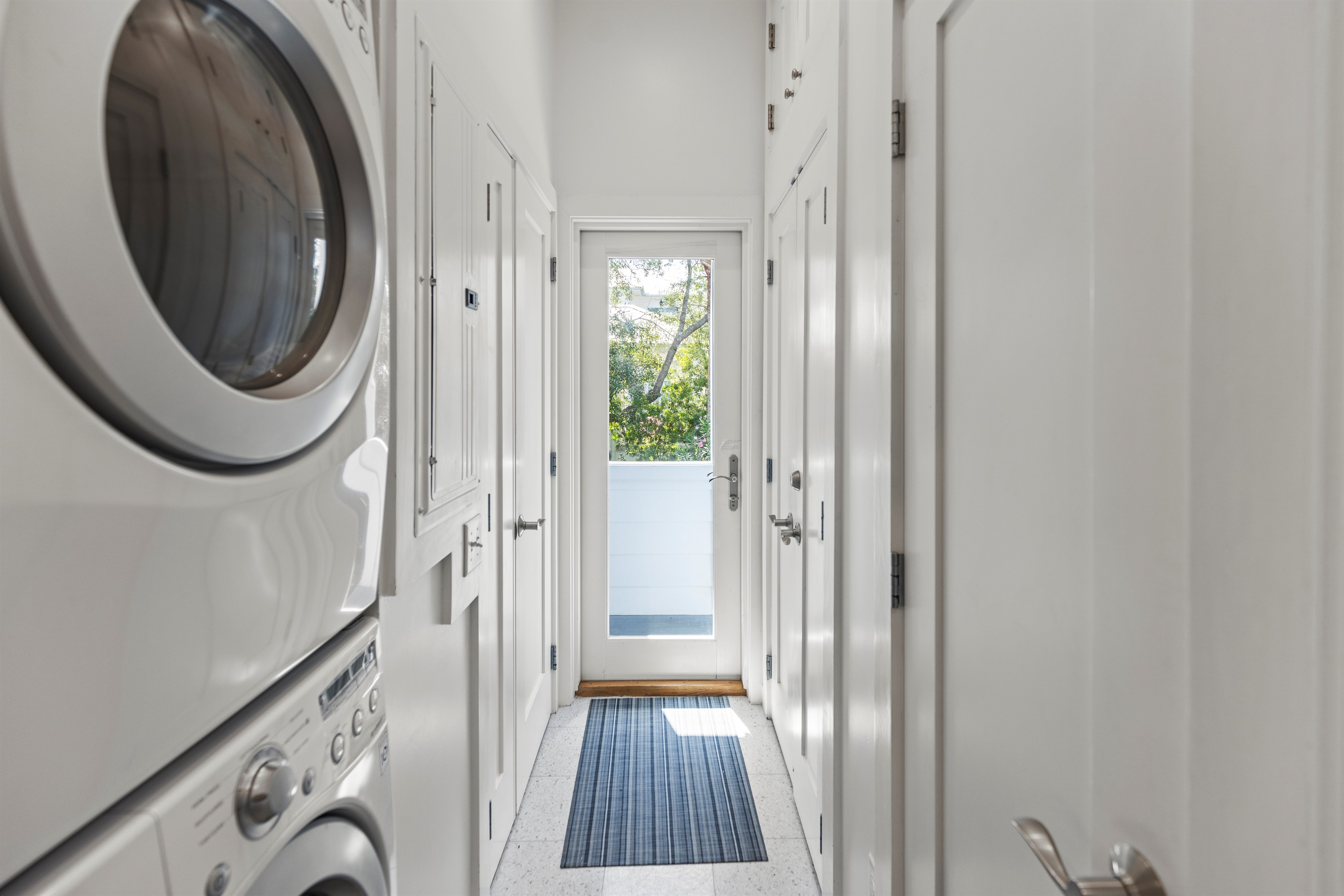 Laundry Hall/Bathroom Leads to Backyard